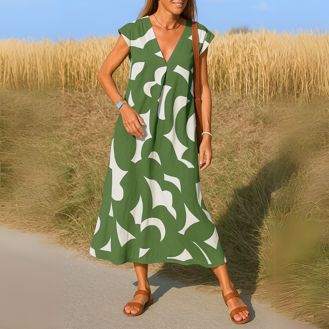 Amina™ Jurk – Zomerse Vrijheid met Grafische Print
