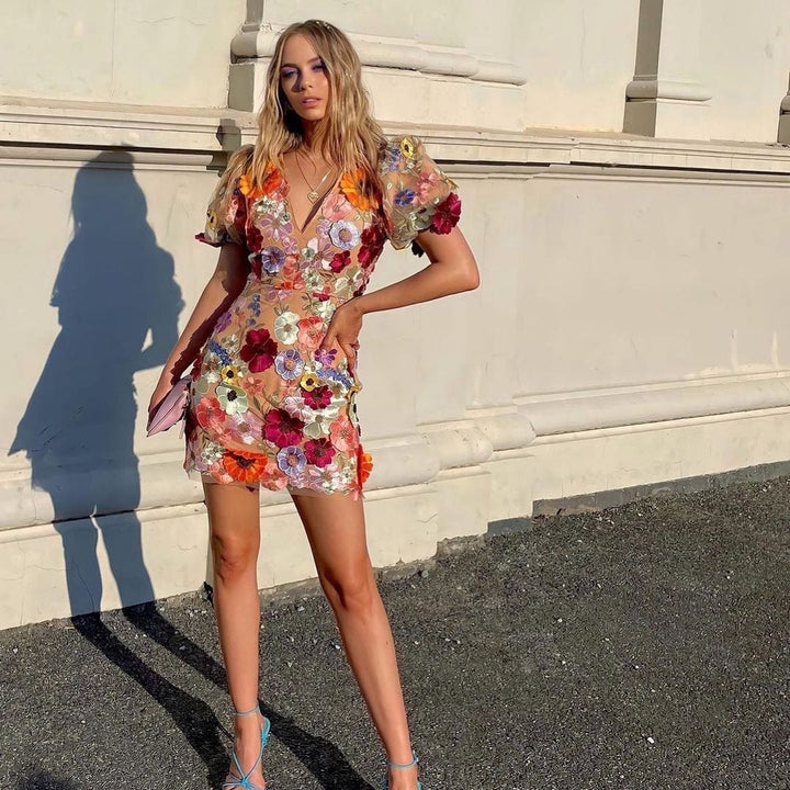Dees | Elegante V-hals jurk met Bloemen Print
